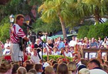 musician singing to the crowd